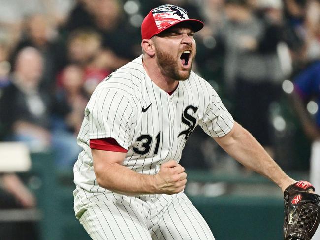 CHICAGO, ILLINOIS - JULY 04: Liam Hendriks #31 of the Chicago White Sox reacts after striking out a batter in the eighth inning against the Minnesota Twins at Guaranteed Rate Field on July 04, 2022 in Chicago, Illinois.   Quinn Harris/Getty Images/AFP == FOR NEWSPAPERS, INTERNET, TELCOS & TELEVISION USE ONLY ==