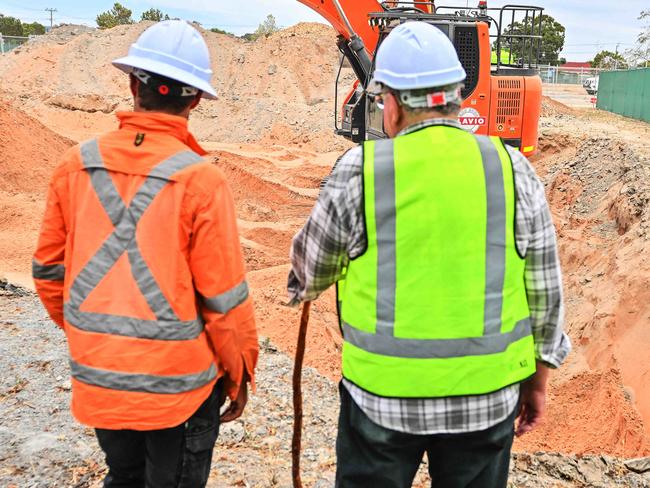 ADELAIDE, AUSTRALIA - NewsWire Photos FEBRUARY 22, 2025: Professor Maciej Henneberg in yellow hi-viz at the site being excavated in a last-ditch attempt to find the remains of the three missing Beaumont children before the government-owned site is sold to developers. Picture: NewsWire / Brenton Edwards