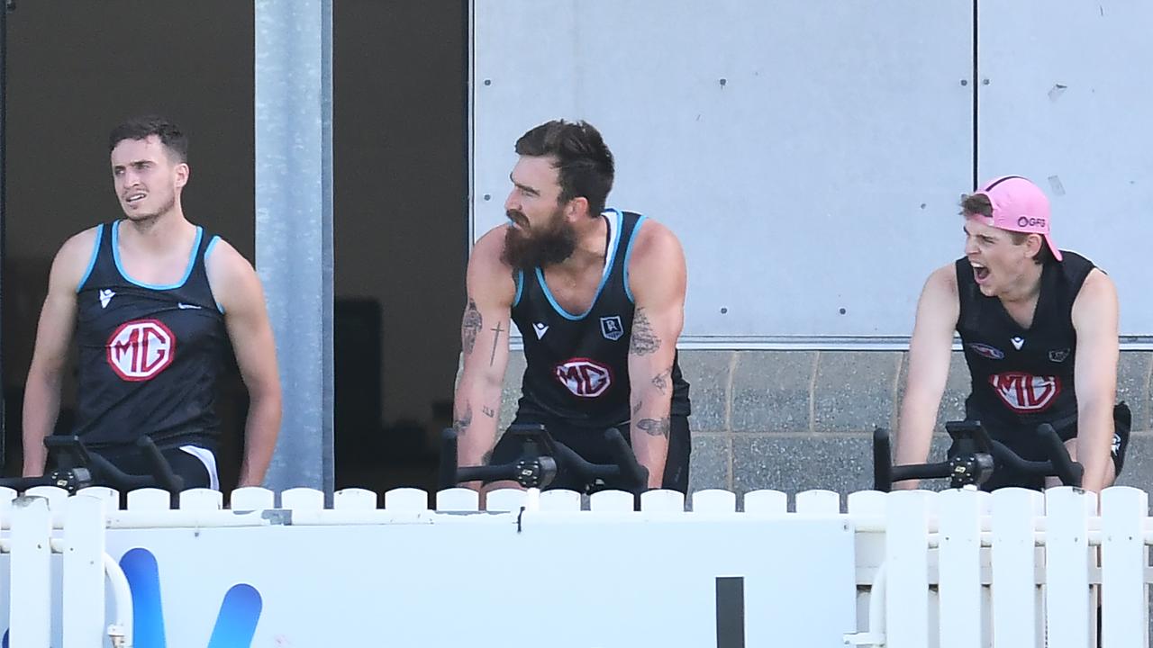 Orazio Fantasia, Charlie Dixon and Hugh Jackson watch on at Port Adelaide training. Picture: Mark Brake