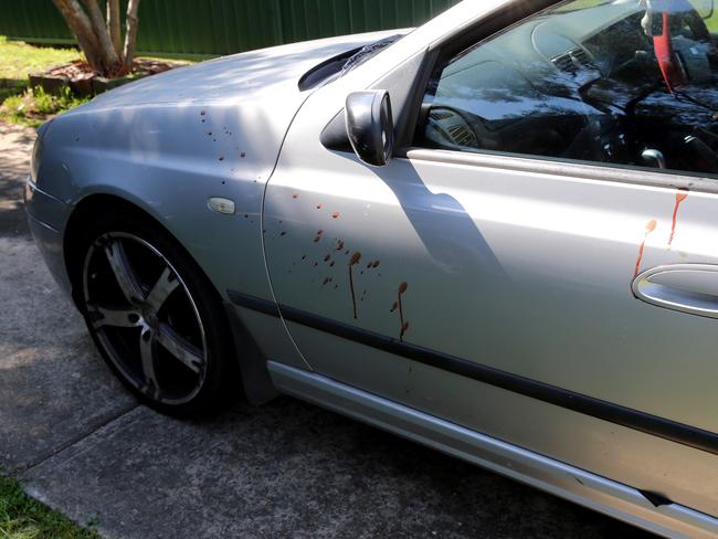 Blood stains an Ohlfsen Road residents car after the attack.