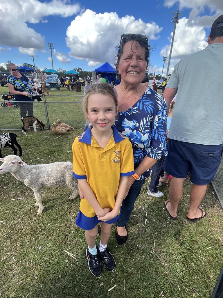 Chris Jones and Isabella Wallace at the petting zoo at the Fraser Coast Show.