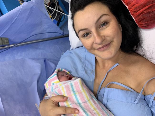 April Hagan with her baby girl Mickey born in April. She had a planned caesarean to avoid permanent incontinence.