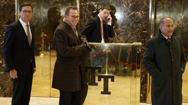 “Mr Trump, I have some gentlemen here to see you.” BHP Billiton’s Geoff Healy, Andrew Mackenzie and Jac Nasser wait in the lobby of Trump Tower before meeting Donald Trump. Pic: AP