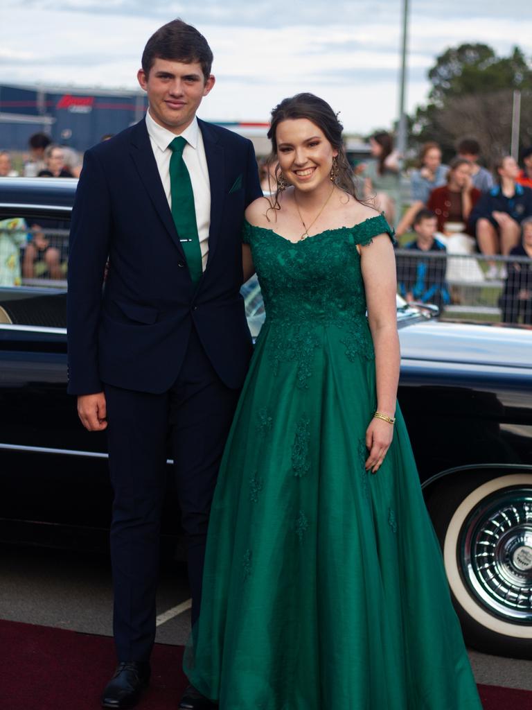 Caleb Reinke and Laura Schmeider arrived in a 1959 Cadillac.