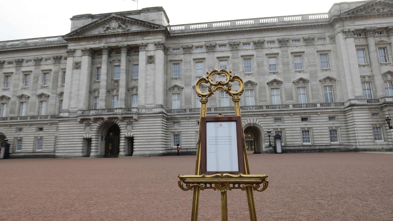 An official notice set up on an easel at the gates of Buckingham Palace in London announcing the birth. Picture: Tolga Akmen/AFP