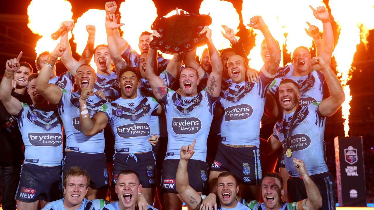 The victorious NSW Blues players after their win in Game III last year.