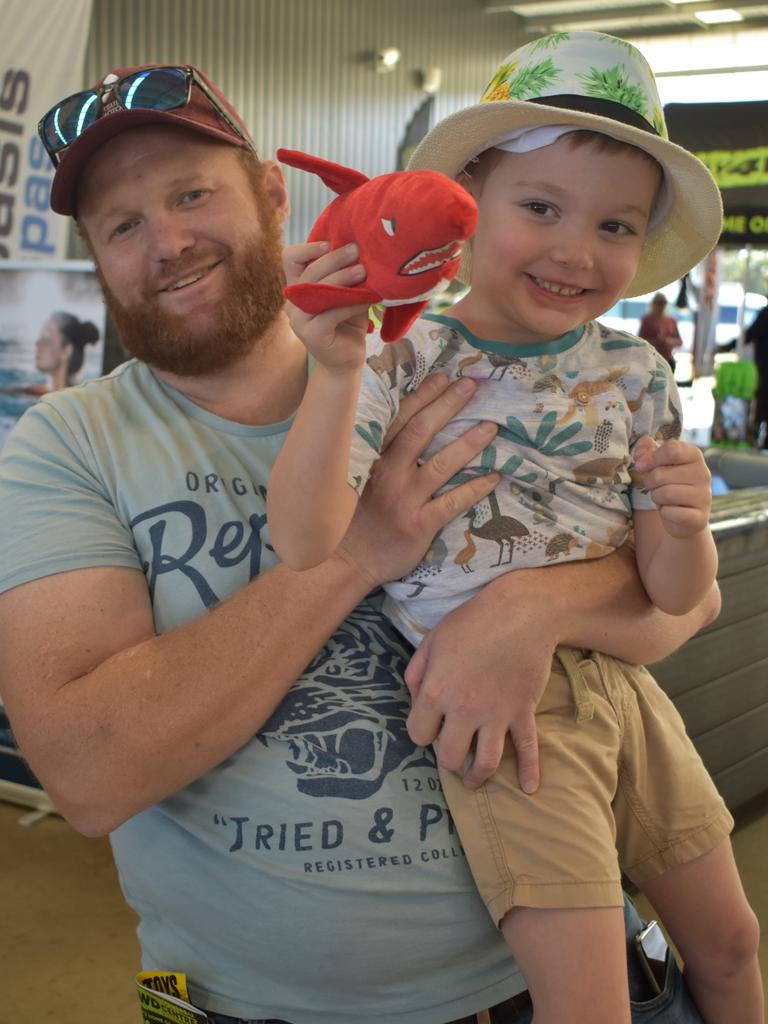 Adam and Benne, 5, Van Nunen, with his new red shark at Big Boys Toys Expo at Mackay Showgrounds 2021. Photo: Janessa Ekert and Tara Miko