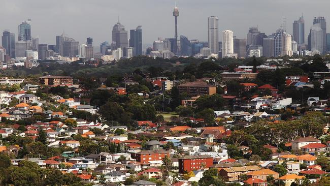 Various aerial photos over Sydney. The eastern suburbs with the CBD skyline in the background.