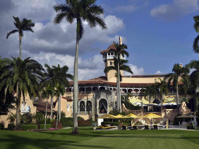 (FILES) In this file photo taken on November 27, 2016 a general view shows the back entrance to the Mar-a-Lago estate of US President-elect Donald Trump in Palm Beach, Florida. - Former US president Donald Trump said on August 8, 2022 that his Mar-A-Lago residence in Florida was being "raided" by FBI agents in what he called an act of "prosecutorial misconduct." (Photo by MANDEL NGAN / AFP)