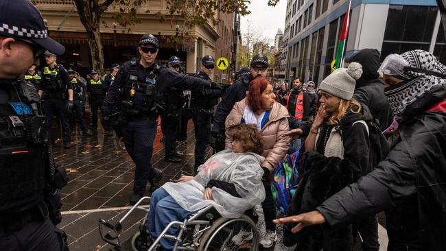 A woman in a wheelchair was among those the pro-Palestine protesters tried to prevent from attending the rally against anti-Semitism. Picture: Getty Images