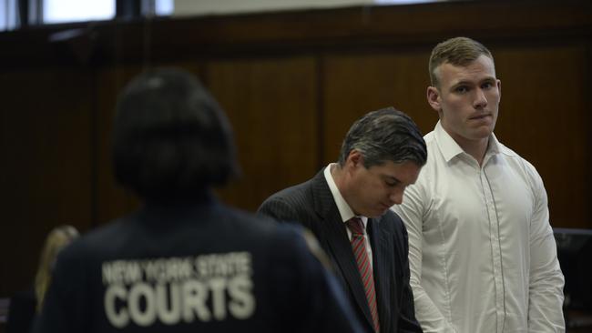 Matt Lodge in court with top Manhattan criminal lawyer Thomas Rotko following his rampage. Picture: Alex Towle