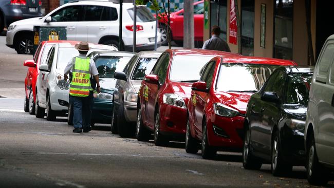 A photo of a parking ranger on patrol in Sydney.