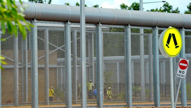 A high fence around Darwin Correctional Centre. The North Australian Aboriginal Justice Agency is calling for the early release of some Aboriginal prisoners from NT prisons in response to the COVID-19 pandemic.