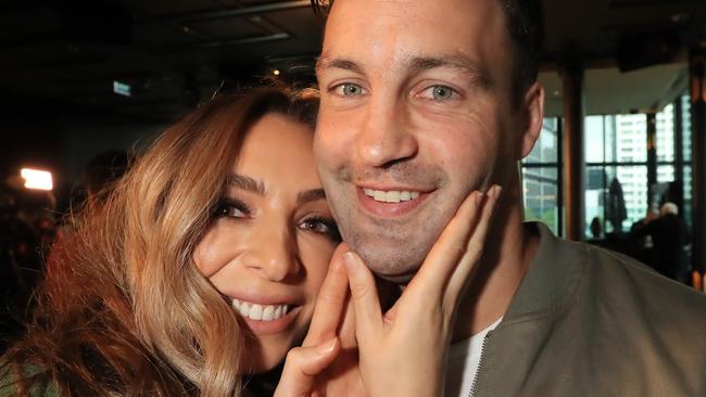 Nadia Bartel with husband Jimmy after shaving his beard off for charity. Picture: Alex Coppel.