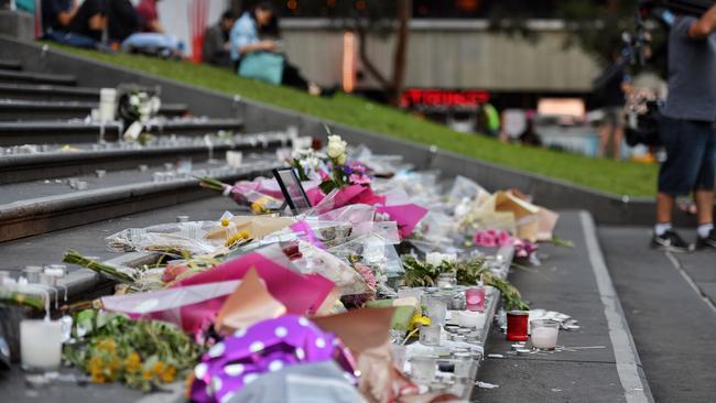 Flowers left at a vigil for victims of the Christchurch massacre in front of Melbourne’s State Library. Picture: Jason Edwards