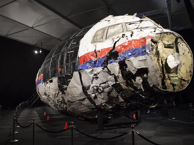 A reconstructed section of the Malaysia Airlines plane that was downed by a missile over Ukraine, killing 298 people at the Gilze-Rijen air force Base, the Netherlands. Picture: AAP