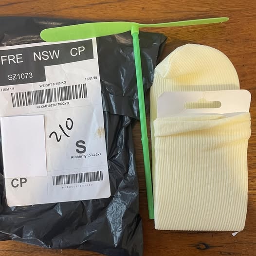 Unsolicited parcels containing a pair of cheap socks and plastic propeller toys were sent to an address on the northern beaches as part of a “brushing” e-commerce scam. Picture: Facebook