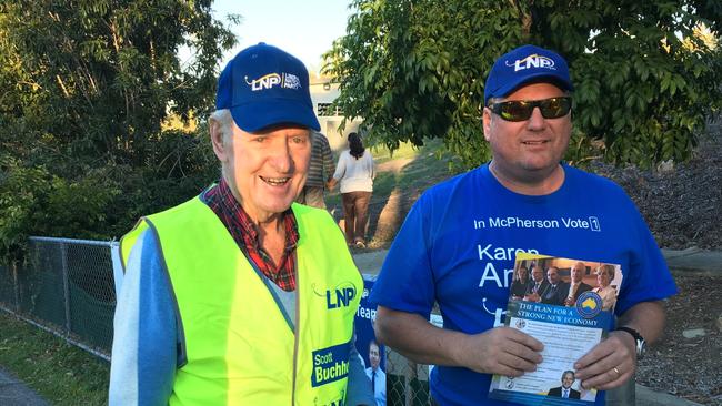 LNP workers Gordon French and Kevin Powell at the Mudgeerabah State School polling station. Photo: Andrew Potts