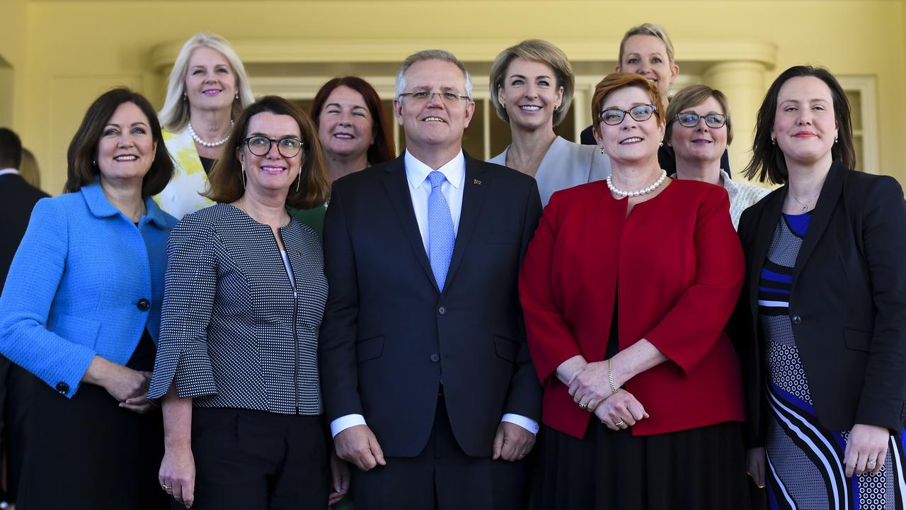 Prime Minister Scott Morrison poses for photographs with female members of his ministry in 2018. Picture: Lukas Coch / AAP