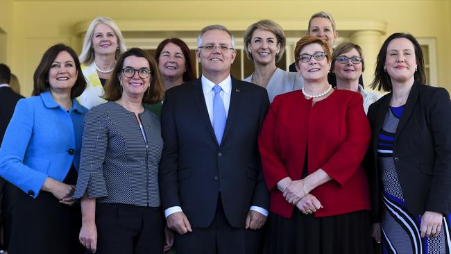 Prime Minister Scott Morrison poses for photographs with female members of his ministry in 2018. Picture: Lukas Coch / AAP