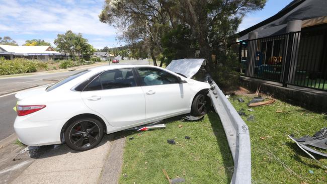 A car crashed beside childcare centre at the 19th Ave and Saffron St roundabout in Elanora. Picture: Richard Gosling.