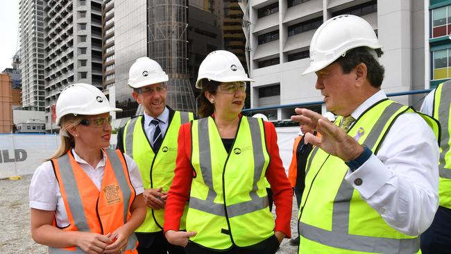 Minister for Innovation and Tourism Industry Development and Minister for the Commonwealth Games, Kate Jones (left), Minister for State Development, Manufacturing, Infrastructure and Planning, Cameron Dick (2nd from left), Queensland Premier Annastacia Palaszczuk (centre) and Star Entertainment Group Chairman, John O'Neill (right) are seen at the Queens Wharf project in Brisbane. (AAP Image/Darren England)