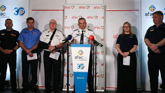 NSW RFS Commissioner Rob Rogers (centre) said hazard reduction burns were ‘way behind’. Picture: NewsWire / Gaye Gerard