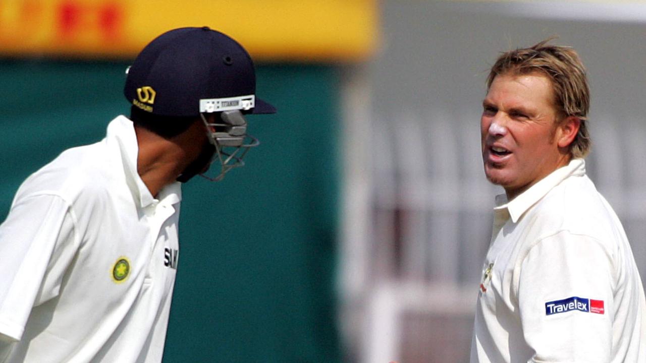 Shane Warne speaks to Mohammed Kaif during Australia’s tour of India in 2004.