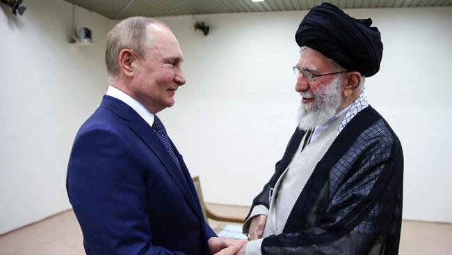 Iranian Supreme Leader Ayatollah Ali Khamenei receiving Russian President Vladimir Putin in Tehran in 2022.