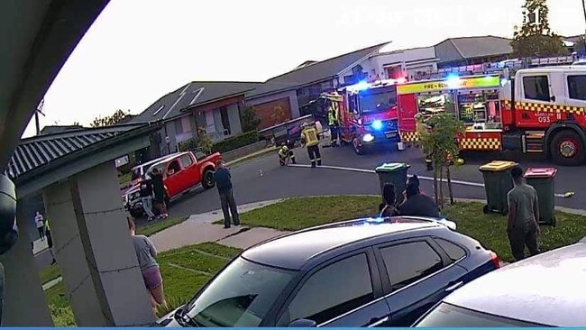 Emergency services rushed to the intersection of Skafe St and Smith St at Oran Park on Sunday evening after a red ute collided with a blue hatchback.