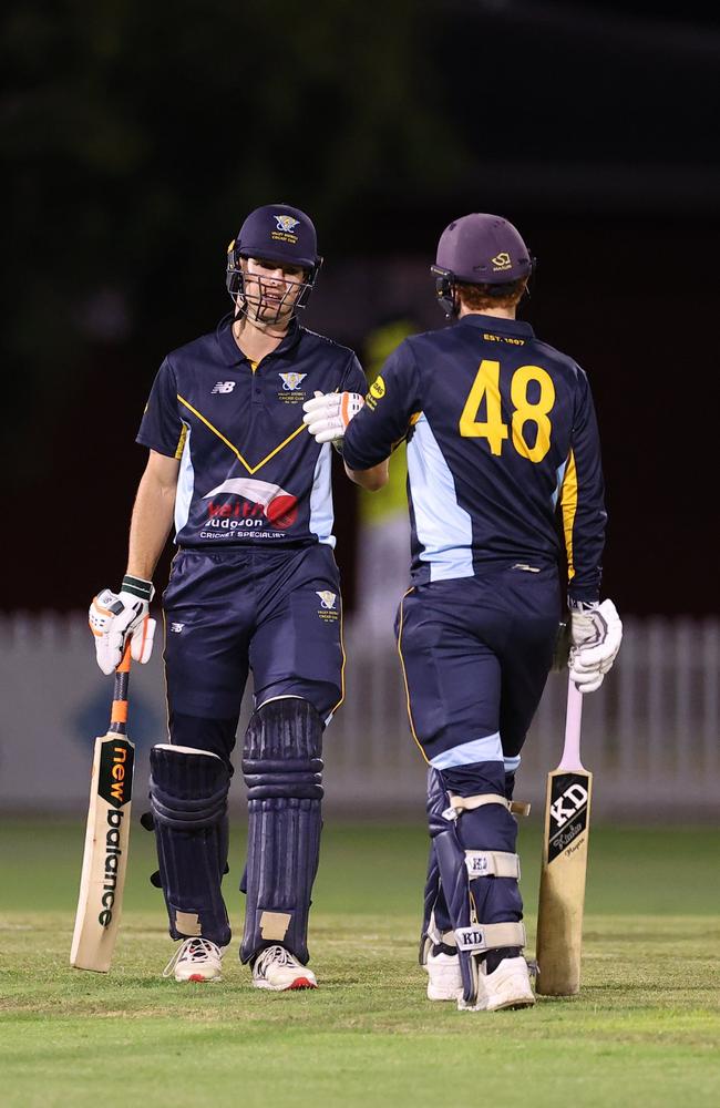 Hugh Weibgen in the middle with Jack Wildermuth during the T20 Max competition. Photo: Queensland Premier Cricket.