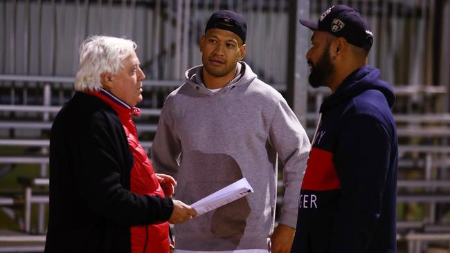 GOLD COAST, AUSTRALIA - MAY 27: Clive Palmer, Israel Folau and Tony Williams talk at Owen Park on May 27, 2021 in Gold Coast, Australia. (Photo by Chris Hyde/Getty Images)