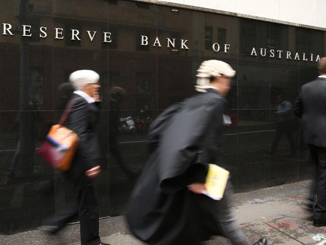 Pedestrians walk past the Reserve Bank of Australia headquarters in Sydney. Picture: Brendon Thorne/Bloomberg.