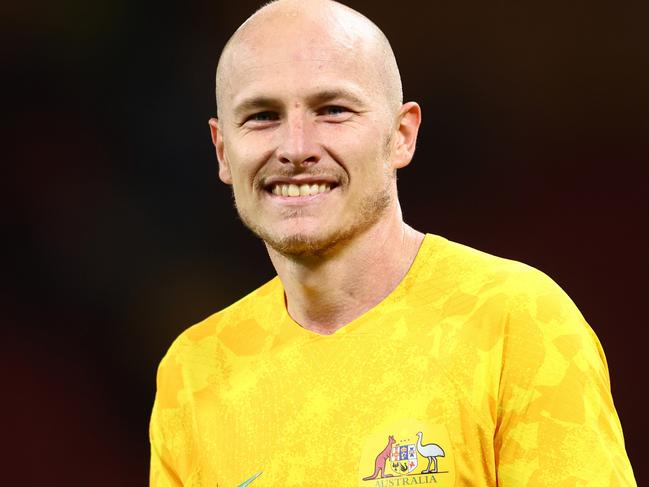 BRISBANE, AUSTRALIA - SEPTEMBER 22: Aaron Mooy of Australia celebrates winning the International Friendly match between the Australia Socceroos and the New Zealand All Whites at Suncorp Stadium on September 22, 2022 in Brisbane, Australia. (Photo by Chris Hyde/Getty Images)