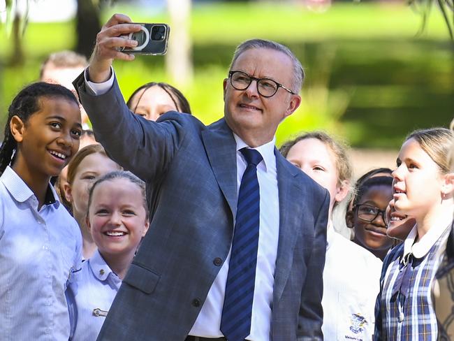 CANBERRA, AUSTRALIA - APRIL 5: Prime Minister of Australia Anthony Albanese takes a selfie with a school group visiting the National Gallery of Australia in Canberra. Picture: NCA NewsWire / Martin Ollman