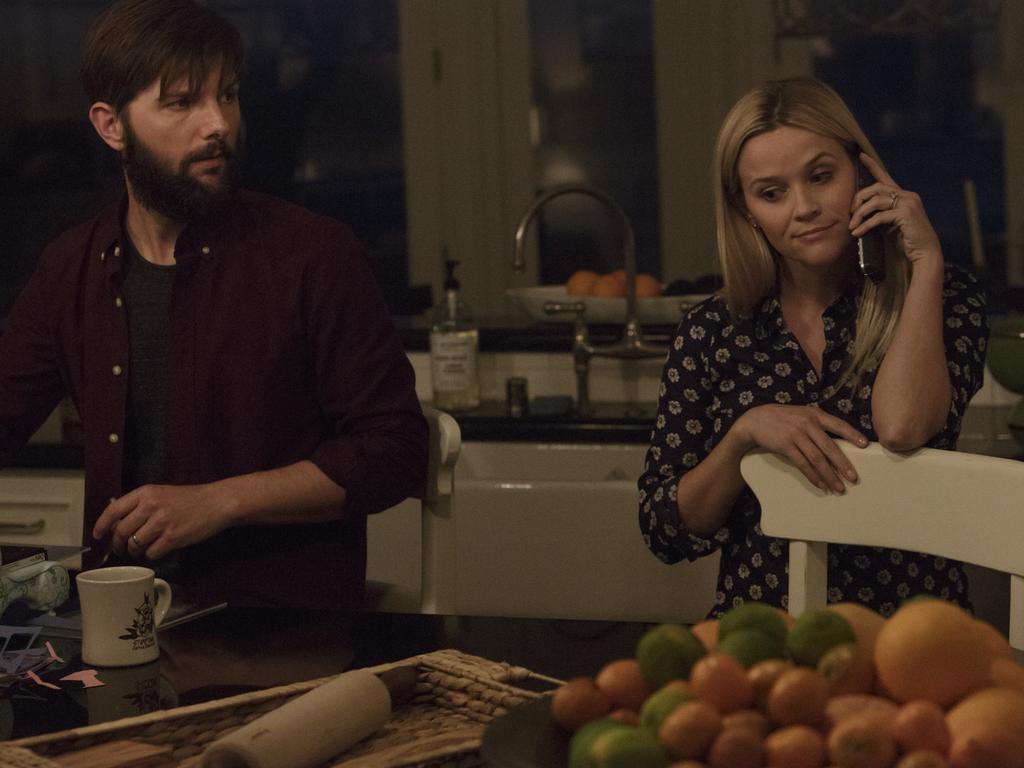 ‘A tap on my shoulder’. Adam Scott, as Ed Mackenzie, on set with Reese Witherspoon as Madeleine, has opened up about the moment he met Meryl Streep. in Big Little Lies. Picture: Foxtel/HBO
