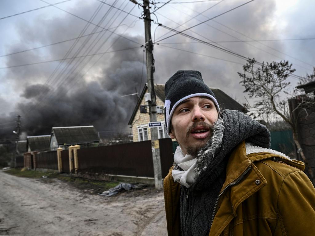 Kyril Kolcheryn, 21, stands on a street in the town of Stoyanka, west of Kyiv. Picture: AFP.