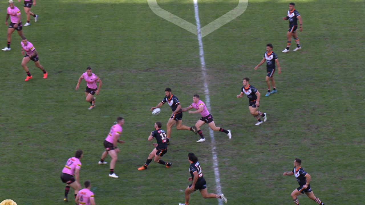 Mitch Kenny grabs James Tamou before he gets the ball.