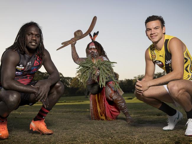 20/08/2020.... Dreamtime in Darwin pic.... On Saturday night for the 1st time Richmond and Essendon will play Dreamtime in Darwin due to Covid-19 not allowing it to be played at the MCG. Essendons  Anthony McDonald-Tipungwuti and Richmonds Daniel Rioli with Luther Cora of the Yugambeh Language Group  .....     . Pic: Michael Klein