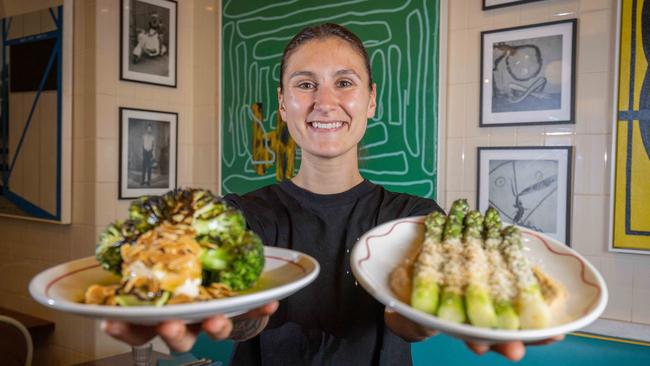 Caitlin Lemish with dishes at Africola restaurant. Picture: Ben Clark