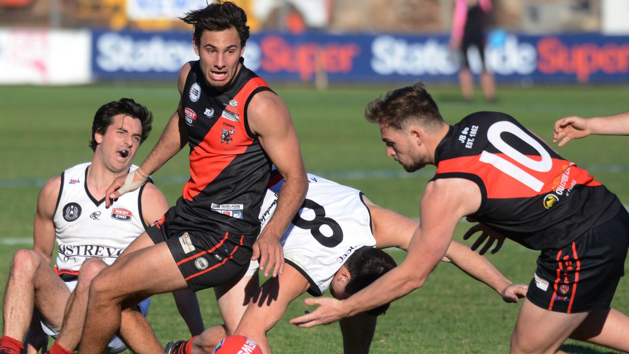 Adelaide Footy League, Division 1 Grand Final Tea Tree Gully v Rostrevor at Thebarton Oval, Saturday, September 22, 2018. Player of the match Troy Menzel and Thomas Blieby from Tea Tree Gully have eyes for the ball. (AAP Image/ Brenton Edwards)