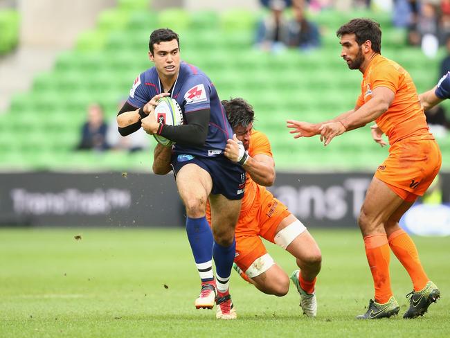 MELBOURNE, AUSTRALIA - APRIL 14: Jack Debreczeni of the Rebals is tackled during the round nine Super Rugby match between the Rebels and the Jaguares at AAMI Park on April 14, 2018 in Melbourne, Australia.  (Photo by Mike Owen/Getty Images)