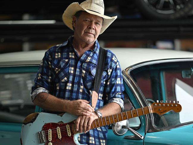 27/3/24 : Country singer-songwriter Troy Cassar-Daley, with his beloved EH Holden , at a workshop in Brendale, Brisbane. pic: Lyndon Mechielsen/The Australian