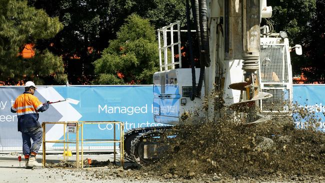 The drilling rig moves the first loads of earth earth on the WestConnex tunnells. Federal Minister for Major Projects Paul Fletcher and NSW Minister for Roads Duncan Gay in Concord at the first sod turning of for the first WestConnex tunnels. Picture: John Appleyard
