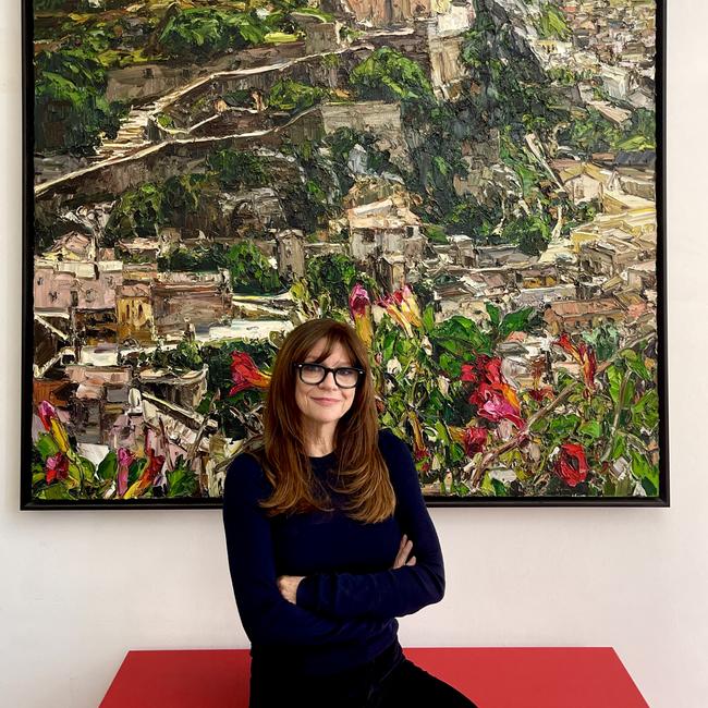 Morris in front of the Nicholas Harding artwork at her home in Sydney. Picture: Paul Clarke