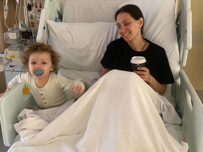 Raphael and his mum Kristen Elias in hospital.