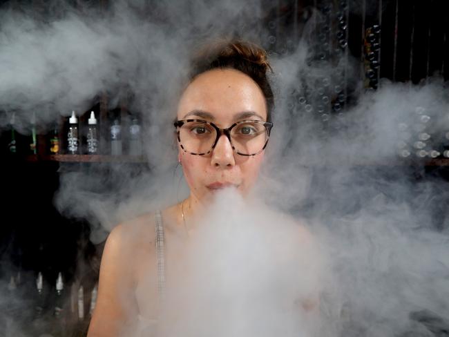 Vaper Tara Douglas in a vape store in Blair Athol, Adelaide, last year. Picture: Kelly Barnes