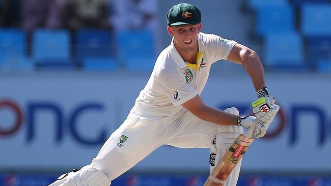 Australian batsman Mitchell Marsh plays a shot during the third day of the first test cricket match against Pakistan at the Dubai International Stadium in Dubai on October 24, 2014. AFP PHOTO/ MARWAN NAAMANI