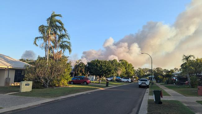 A significant scrub fire burning at the edge of Palmerston on the evening of Monday, September 2, 2024. Picture: Alex Treacy