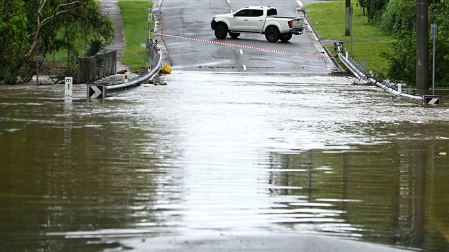 Flash flooding at Springfield Lakes after an early morning storm on Tuesday. Picture: Lyndon Mechielsen/Courier Mail